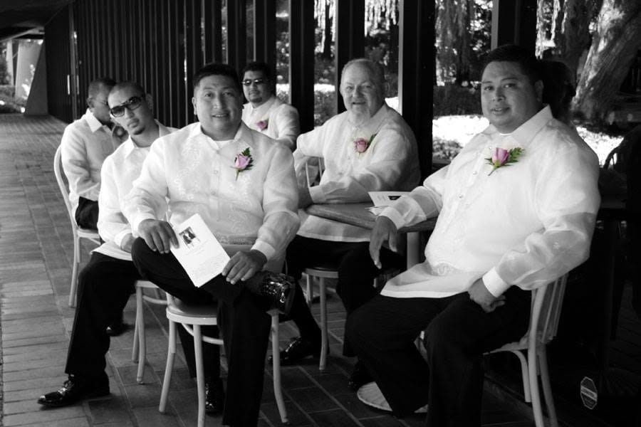 Groomsmen with roses